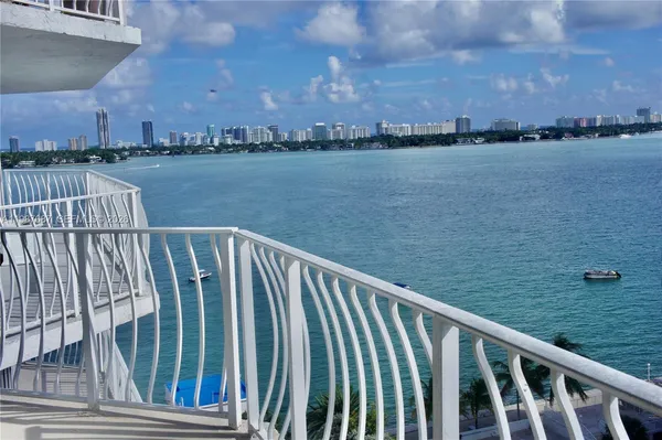 a balcony with an ocean view