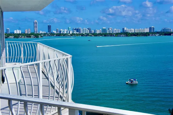 a view of a balcony with city view