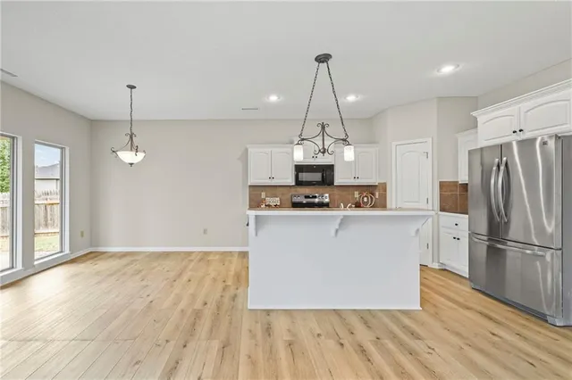 $335,900 | 706 Northwest Green Drive, Grain Valley, MO 64029