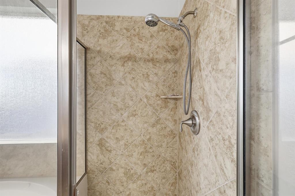 3513 Durango Root Court Fort Worth, TX 76244 - Photo 21 of 34 a bathroom with a shower