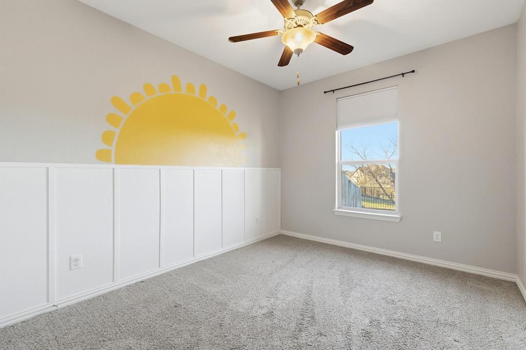 3513 Durango Root Court Fort Worth, TX 76244 - Photo 23 of 34 an empty room with windows and fan