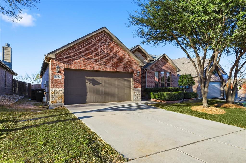 3513 Durango Root Court Fort Worth, TX 76244 - Photo 33 of 34 a front view of a house with a yard