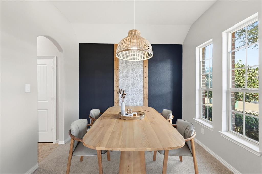 3513 Durango Root Court Fort Worth, TX 76244 - Photo 4 of 34 a dining table with a mirror