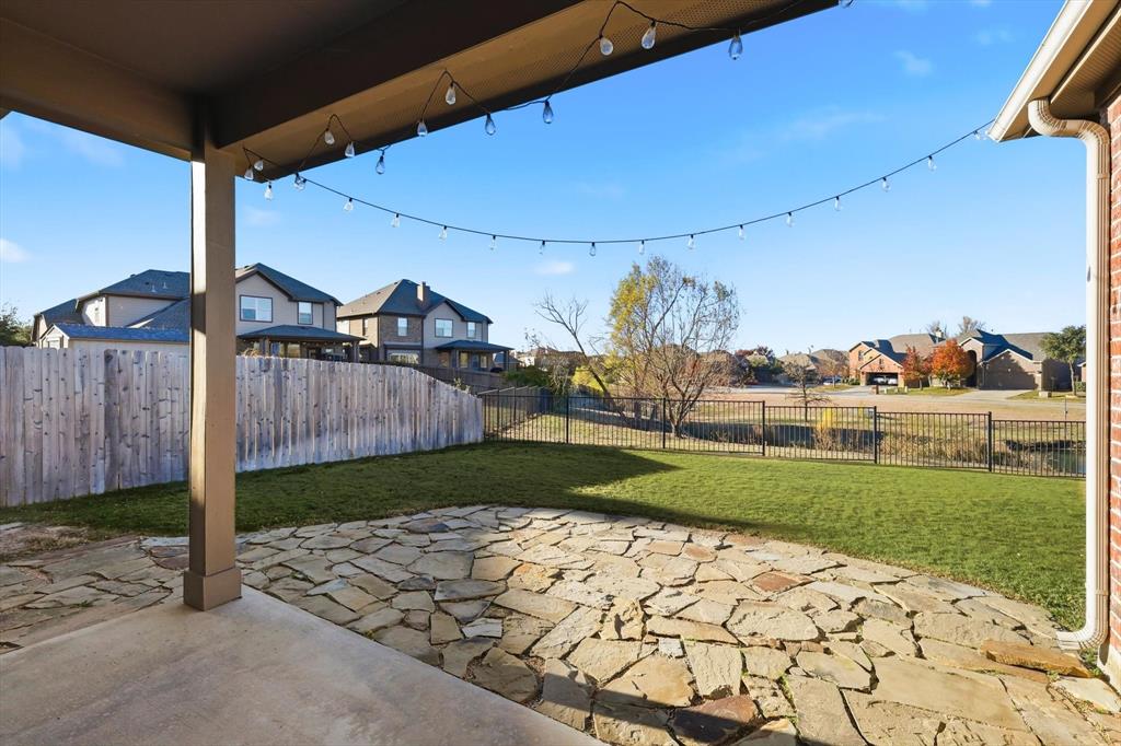 3513 Durango Root Court Fort Worth, TX 76244 - Photo 5 of 34 a view of a porch with a yard