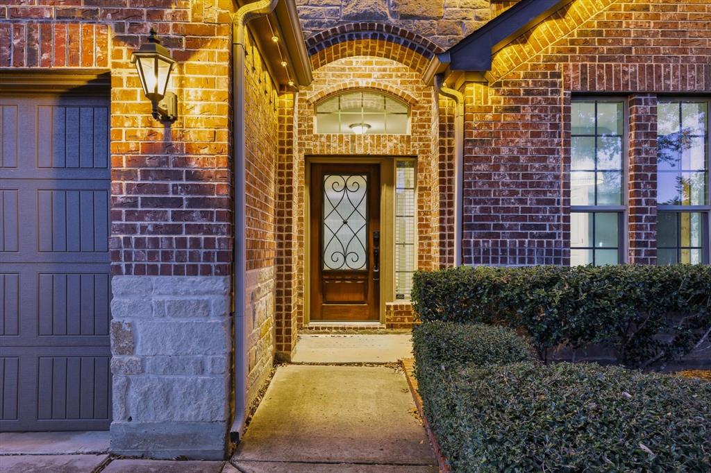 3513 Durango Root Court Fort Worth, TX 76244 - Photo 6 of 34 a view of a brick building with a large windows