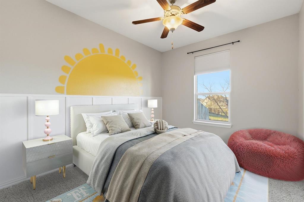 3513 Durango Root Court Fort Worth, TX 76244 - Photo 10 of 34 a bedroom with a bed and a chandelier