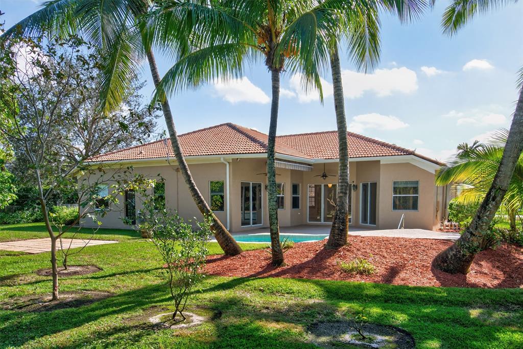 15601 Southwest 15th Street Davie, FL 33326 - Photo 16 of 52 a front view of house with yard and green space