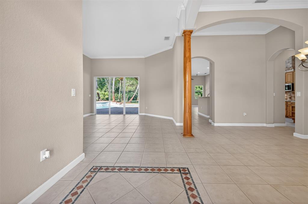 15601 Southwest 15th Street Davie, FL 33326 - Photo 18 of 52 a view of an empty room with glass door