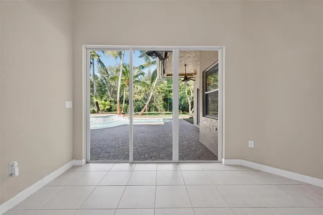 a view of a bathroom with mirror