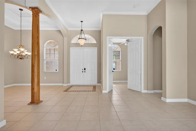 a kitchen with stainless steel appliances a stove refrigerator sink and cabinets