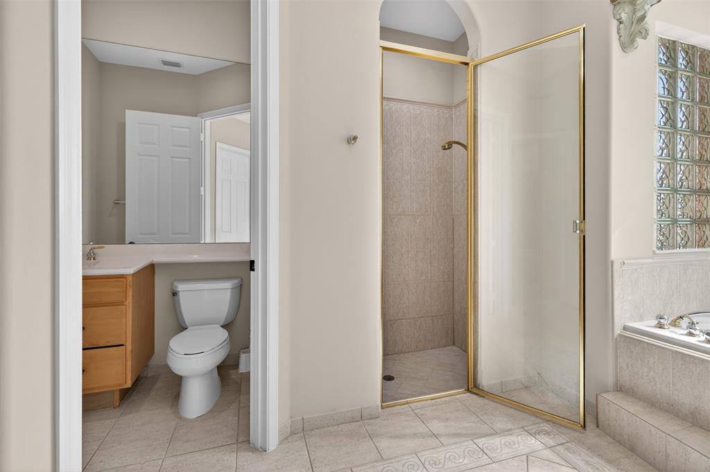 15601 Southwest 15th Street Davie, FL 33326 - Photo 33 of 52 a bathroom with a toilet and a shower