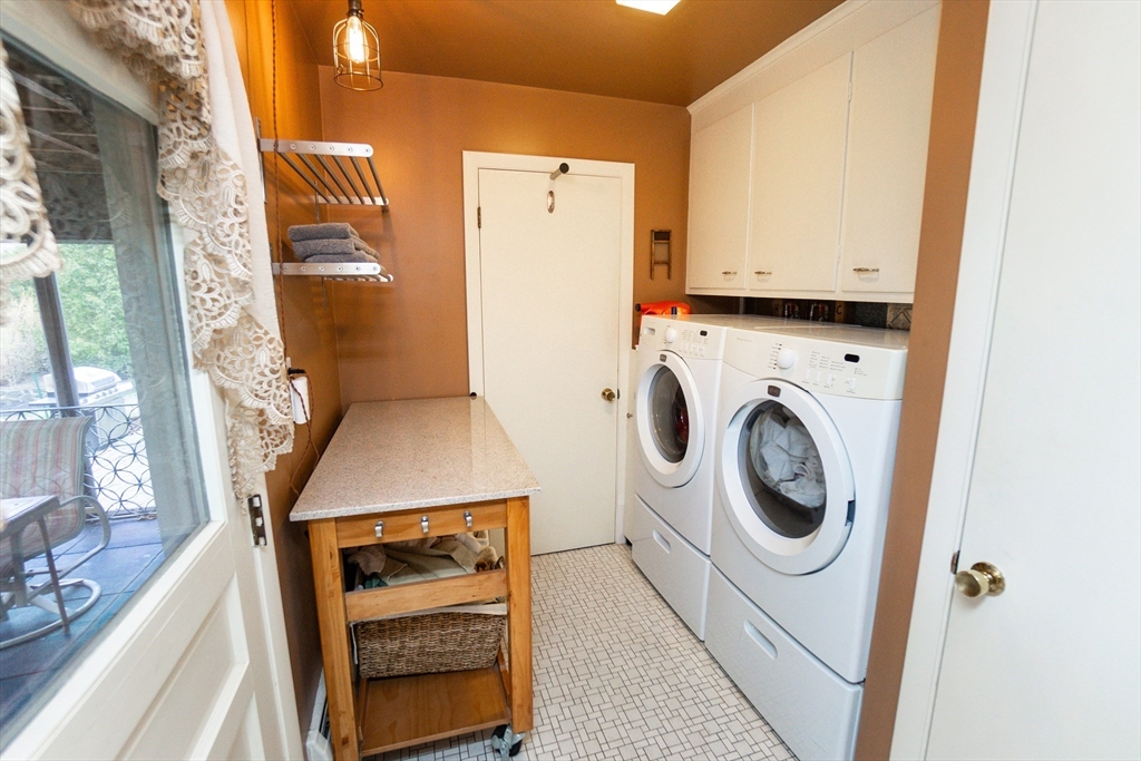 6 Leo Road Marblehead, MA 01945 - Photo 16 of 36 a utility room with dryer and washer
