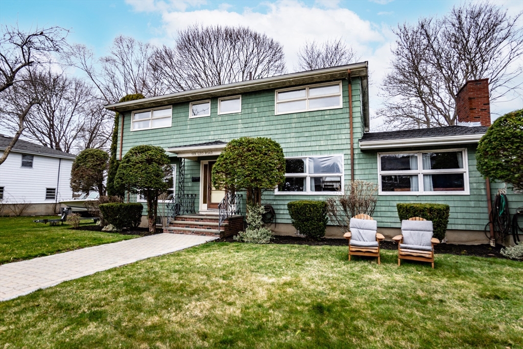 6 Leo Road Marblehead, MA 01945 - Photo 2 of 36 a front view of a house with garden