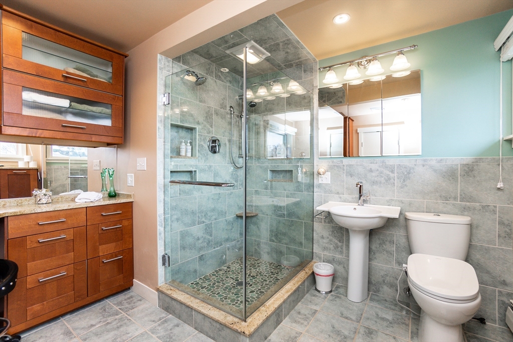 6 Leo Road Marblehead, MA 01945 - Photo 23 of 36 a bathroom with a sink toilet and shower