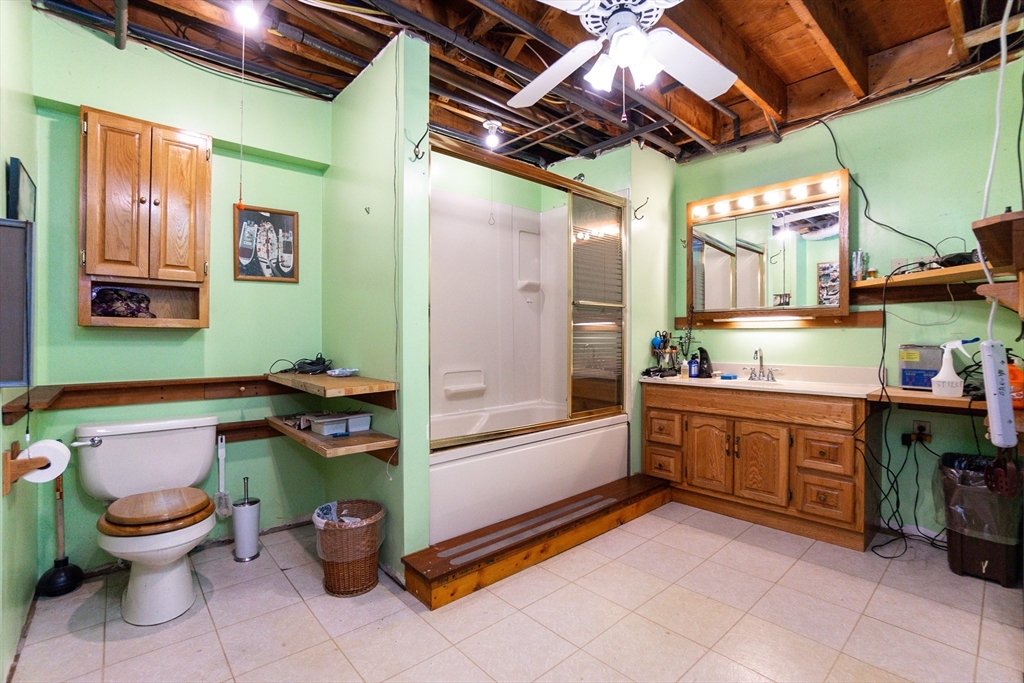 6 Leo Road Marblehead, MA 01945 - Photo 31 of 36 a room with musical instruments