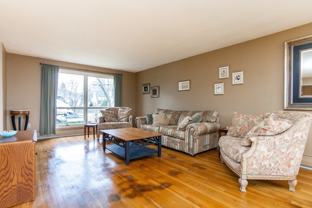 6 Leo Road Marblehead, MA 01945 - Photo 6 of 36 a living room with furniture and a large window