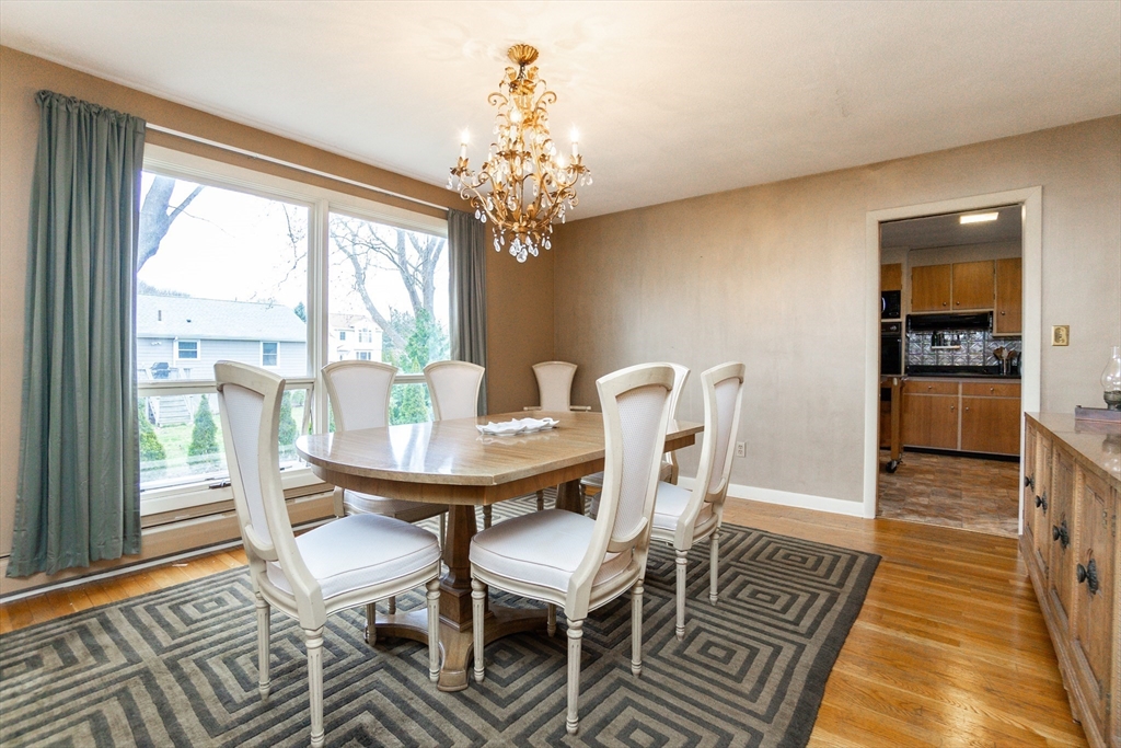 6 Leo Road Marblehead, MA 01945 - Photo 9 of 36 a view of a dining room with furniture window and wooden floor