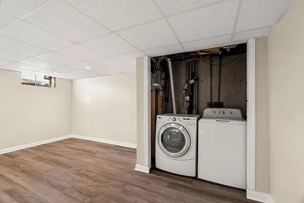 a view of a storage & utility room with washer and dryer