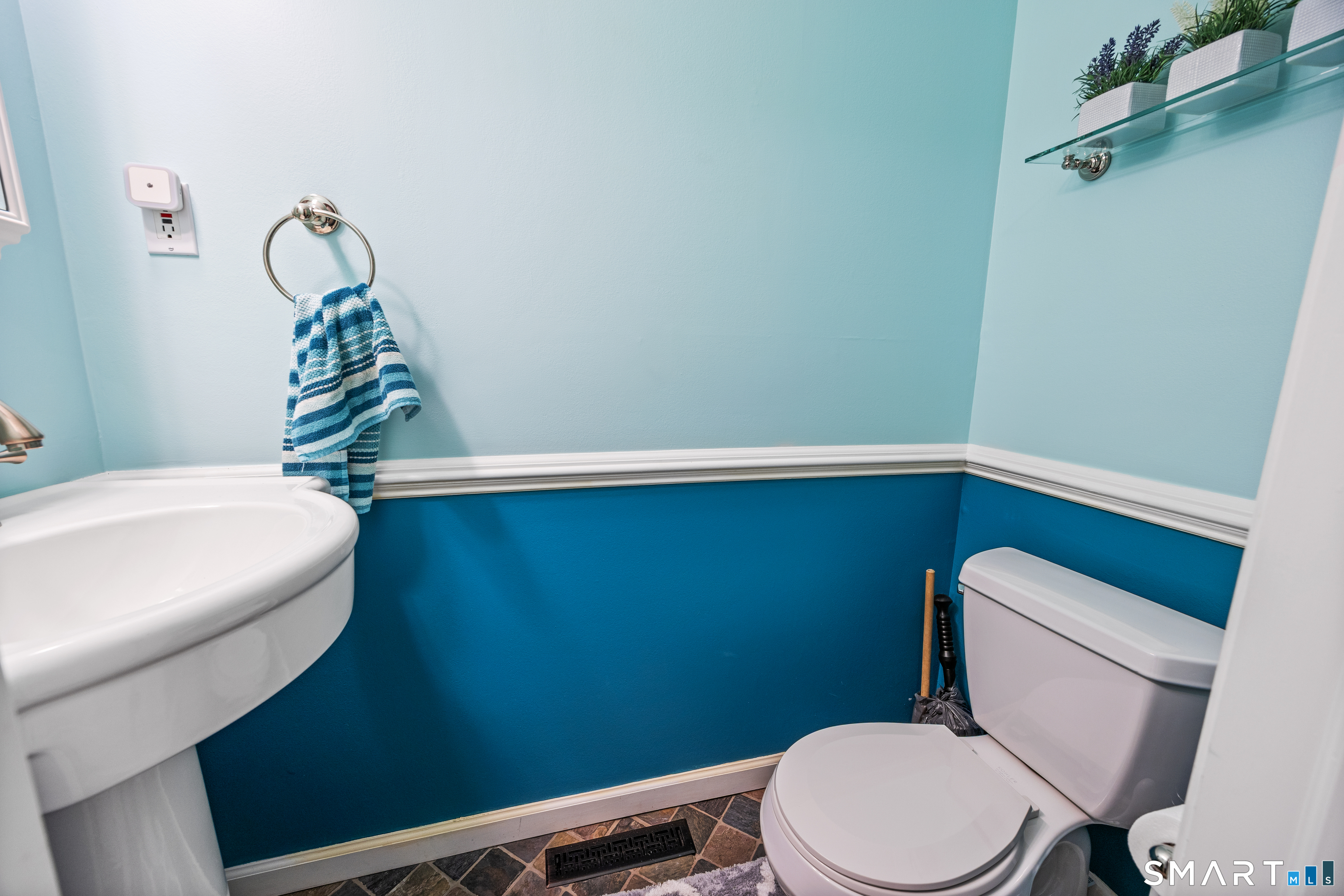 229 Cottonwood Road, Unit 229 Newington, CT 06111 - Photo 11 of 24 a white toilet sitting next to a shower