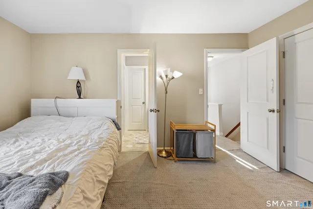 a bed room with a bed and a couch