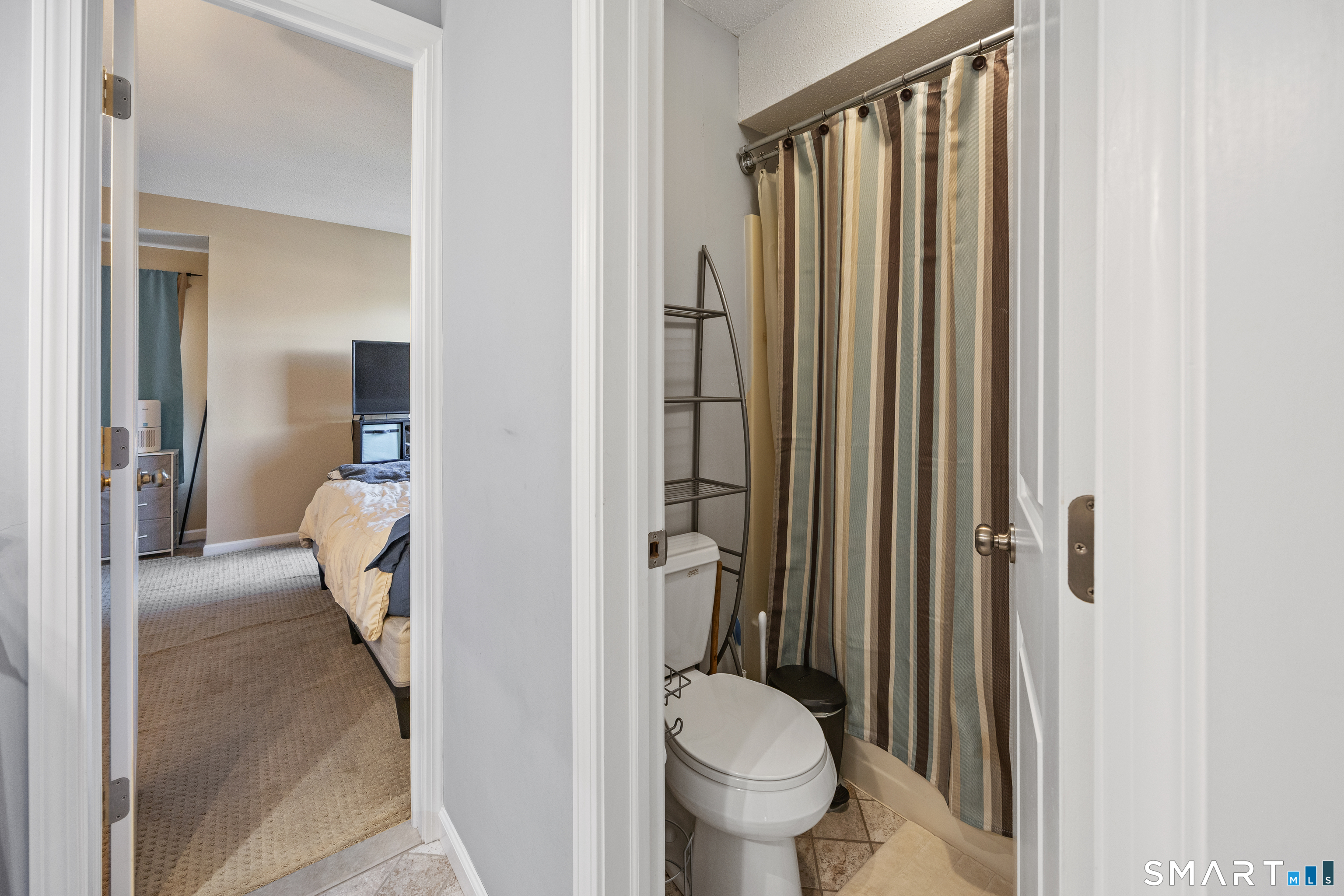 229 Cottonwood Road, Unit 229 Newington, CT 06111 - Photo 17 of 24 a en suite bathroom with a toilet