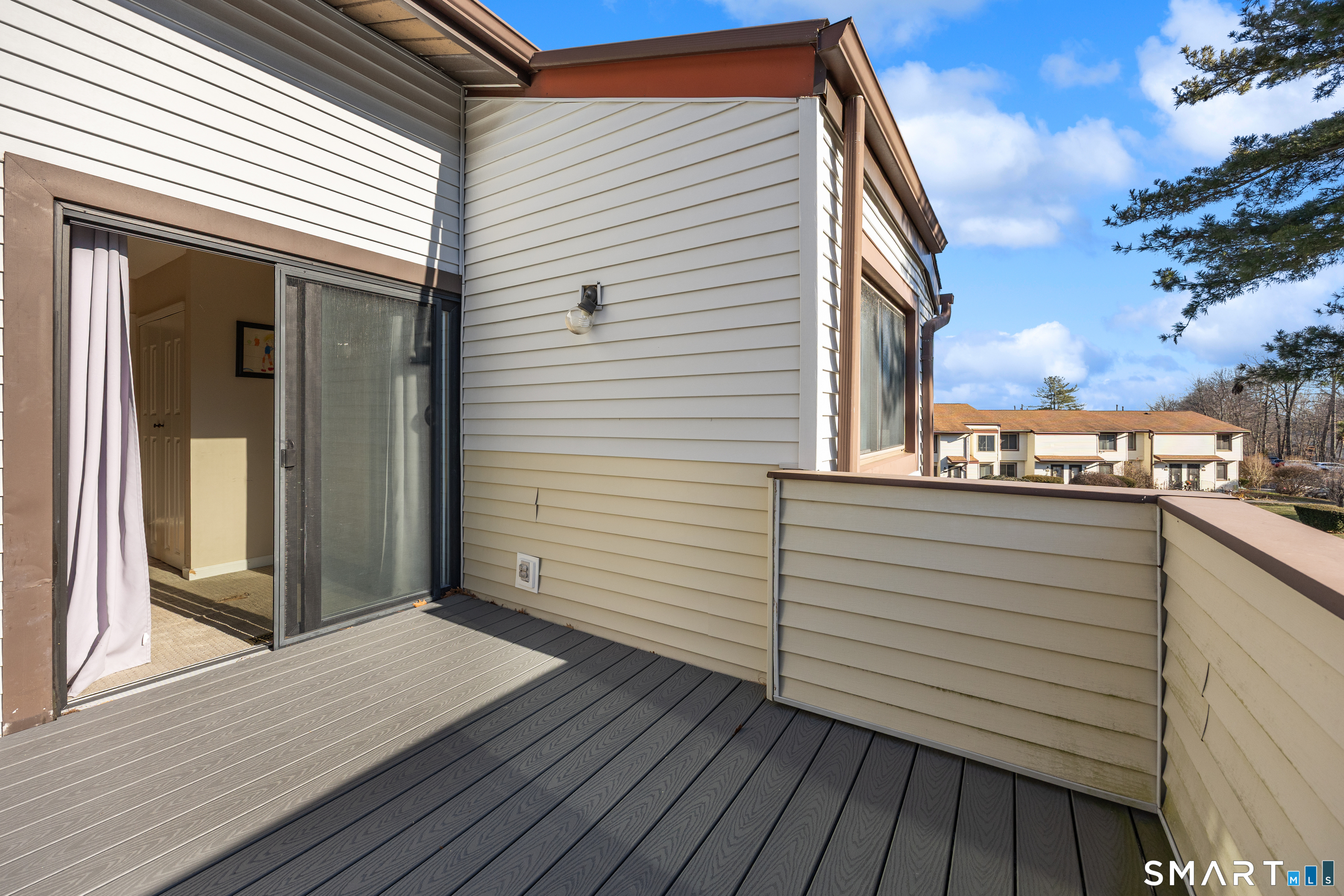 229 Cottonwood Road, Unit 229 Newington, CT 06111 - Photo 21 of 24 a view of a terrace with sky view