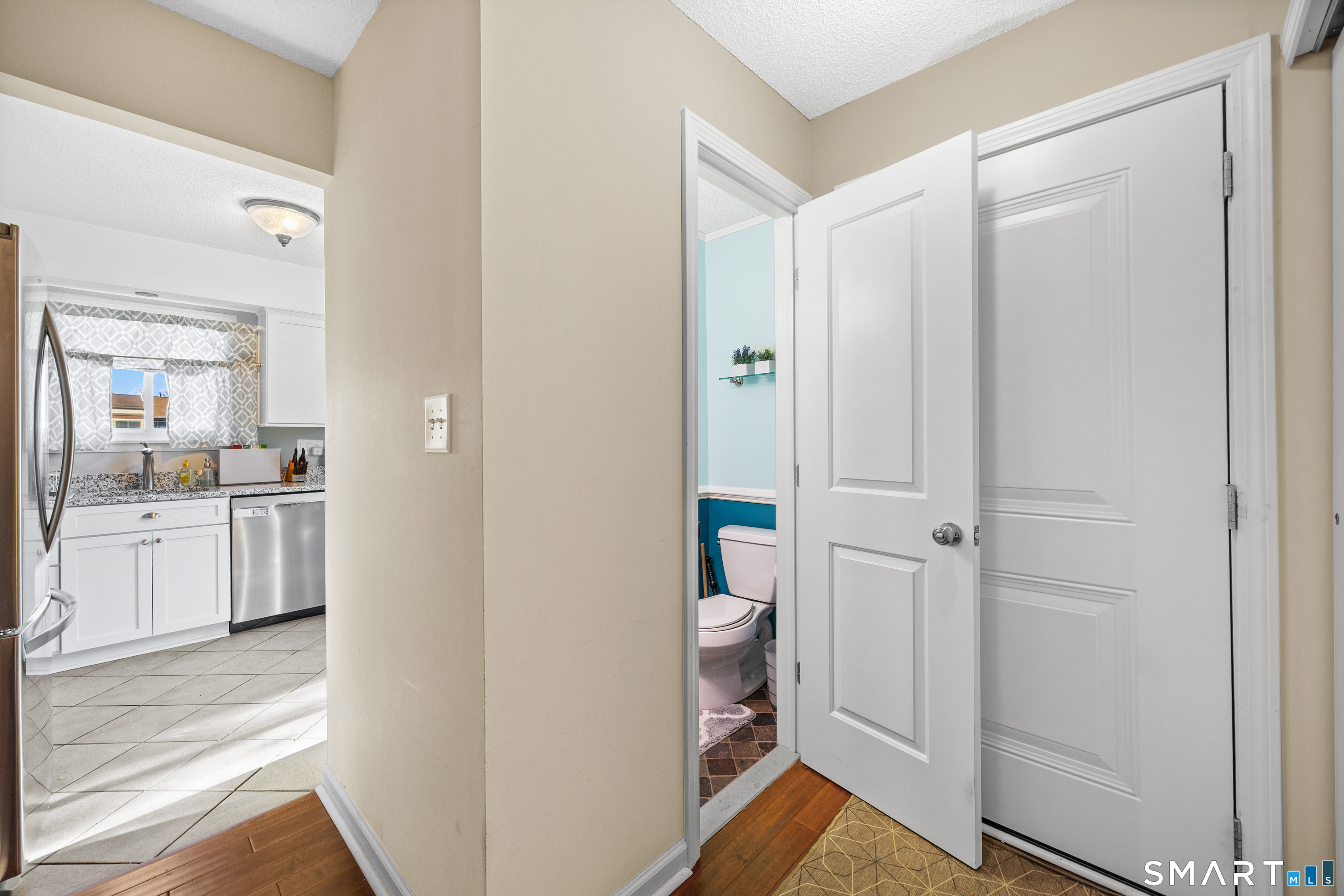 229 Cottonwood Road, Unit 229 Newington, CT 06111 - Photo 10 of 24 a bathroom with a sink and a mirror