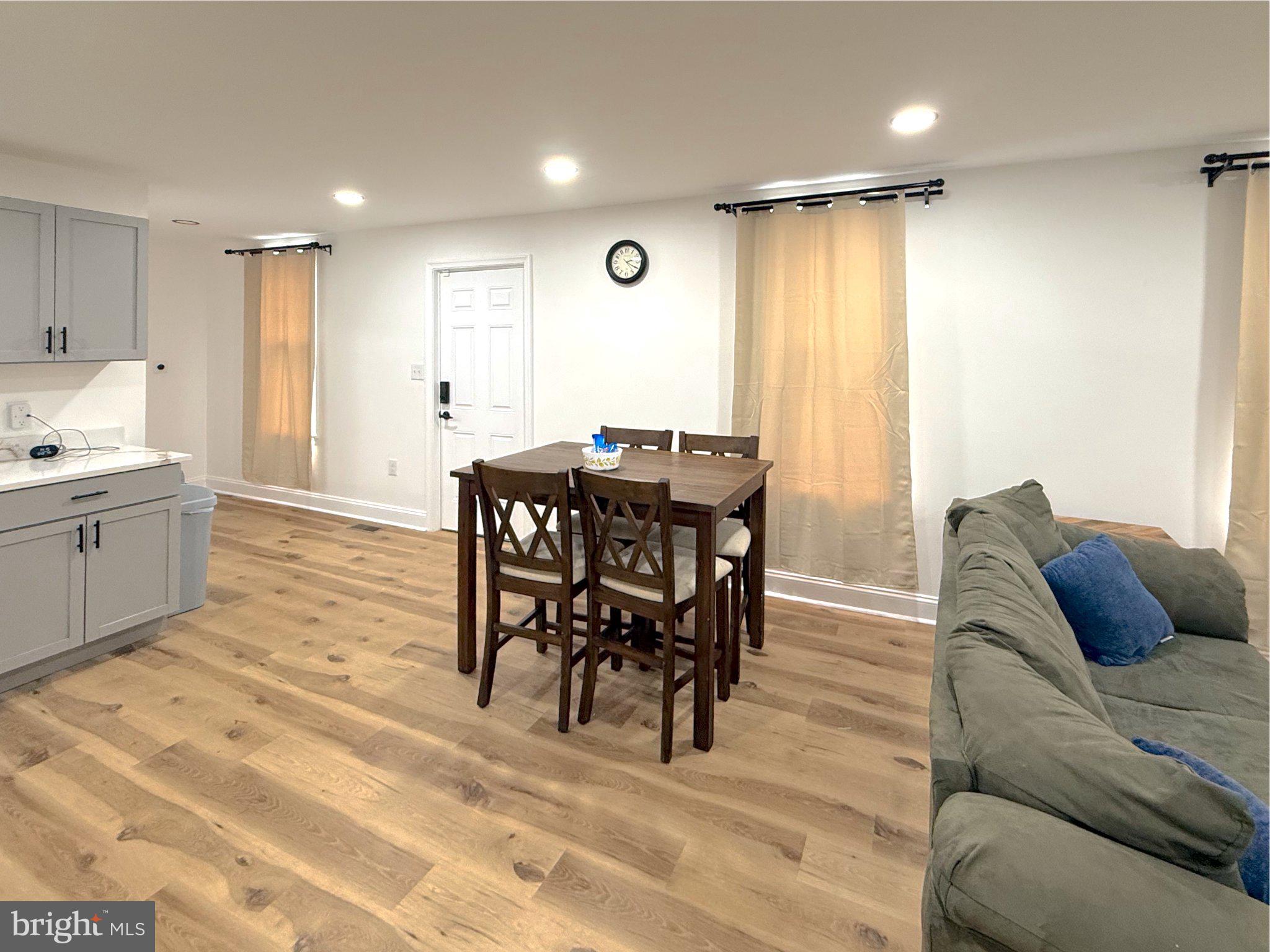 3703 6th Street, Unit 1 Baltimore, MD 21225 - Photo 6 of 12 Bright and inviting open space.