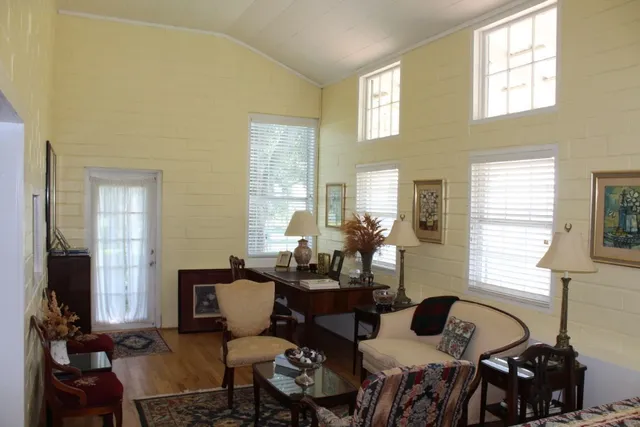 a living room with furniture and a window