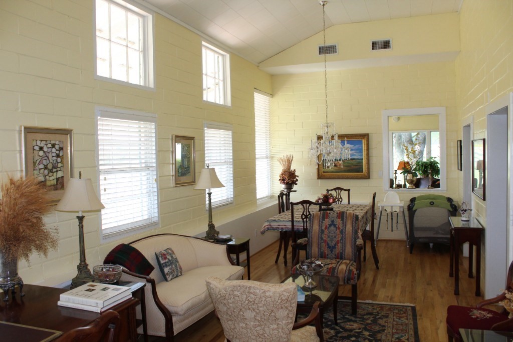 14808 Whitman Road, Unit 2 Washington, TX 77880 - Photo 4 of 11 a living room with furniture and wooden floor