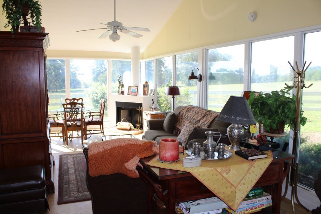 14808 Whitman Road, Unit 2 Washington, TX 77880 - Photo 6 of 11 a view of a dining room with furniture window and outside view