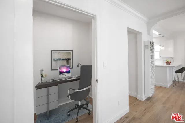 a workspace with wooden floor and a workspace