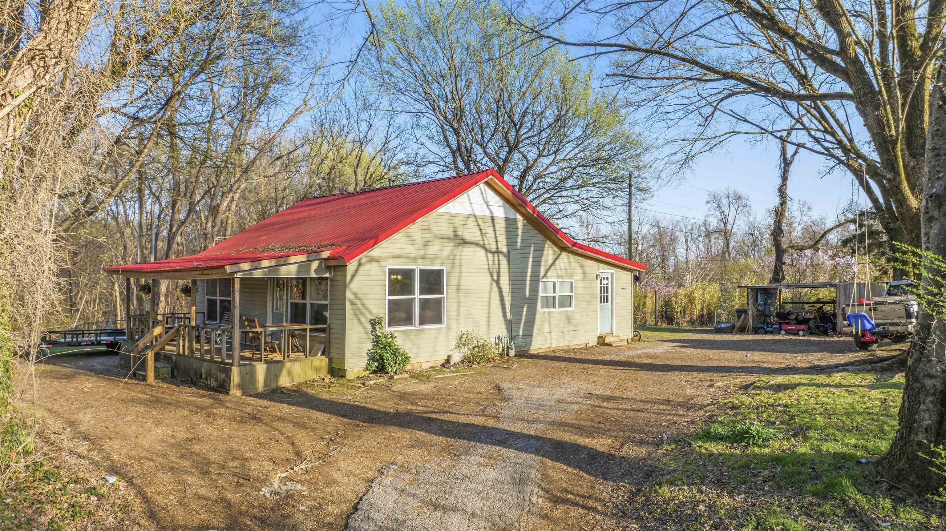 291 Central Curve Road Ripley, TN 38063 - Photo 3 of 13 a view of a house with snow on the road