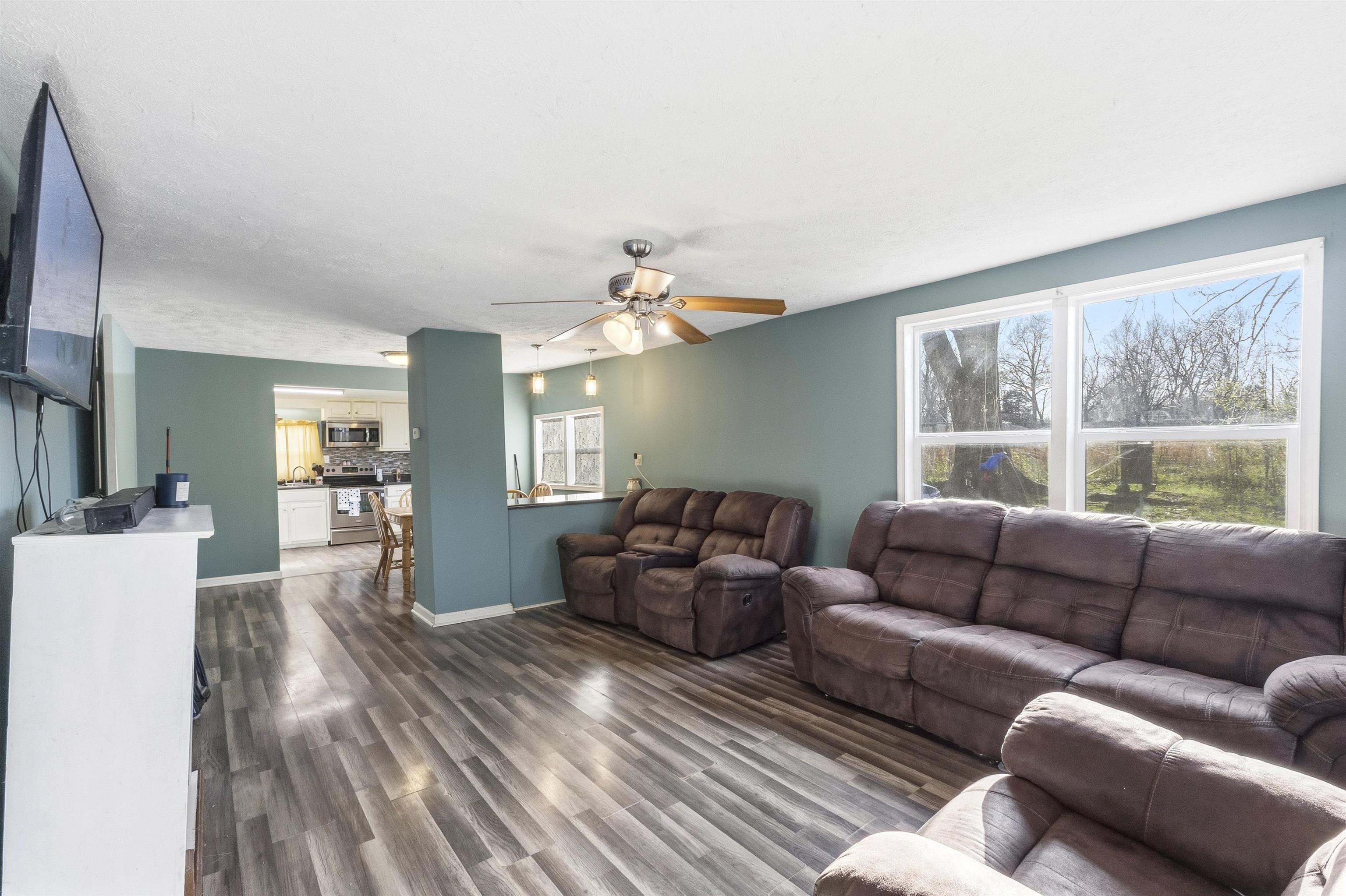 291 Central Curve Road Ripley, TN 38063 - Photo 9 of 13 a living room with furniture and a large window
