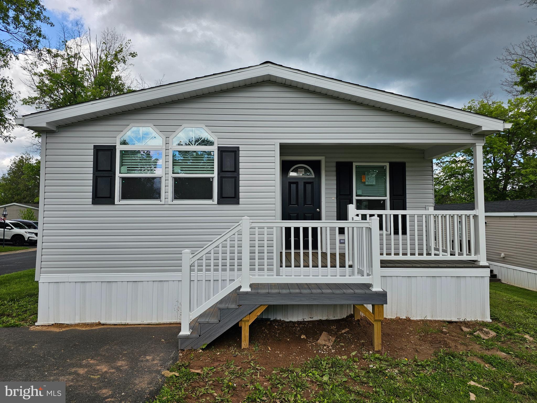 140 Pawnee Avenue Dover, PA 17315 - Photo 1 of 31 a view of a house with a wooden deck and furniture