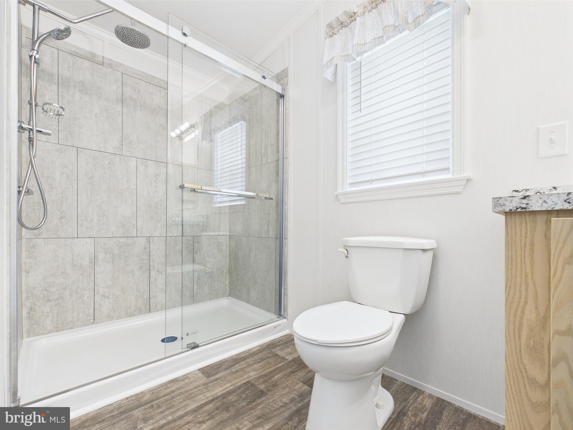 140 Pawnee Avenue Dover, PA 17315 - Photo 22 of 31 a bathroom with a toilet a sink and shower