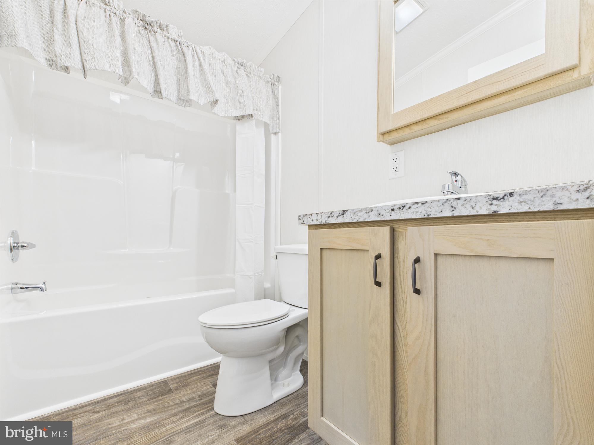 140 Pawnee Avenue Dover, PA 17315 - Photo 25 of 31 a bathroom with a sink a toilet and shower