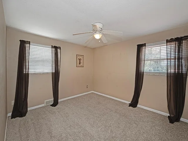 an empty room with closet