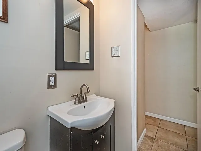 a bathroom with a sink and a toilet