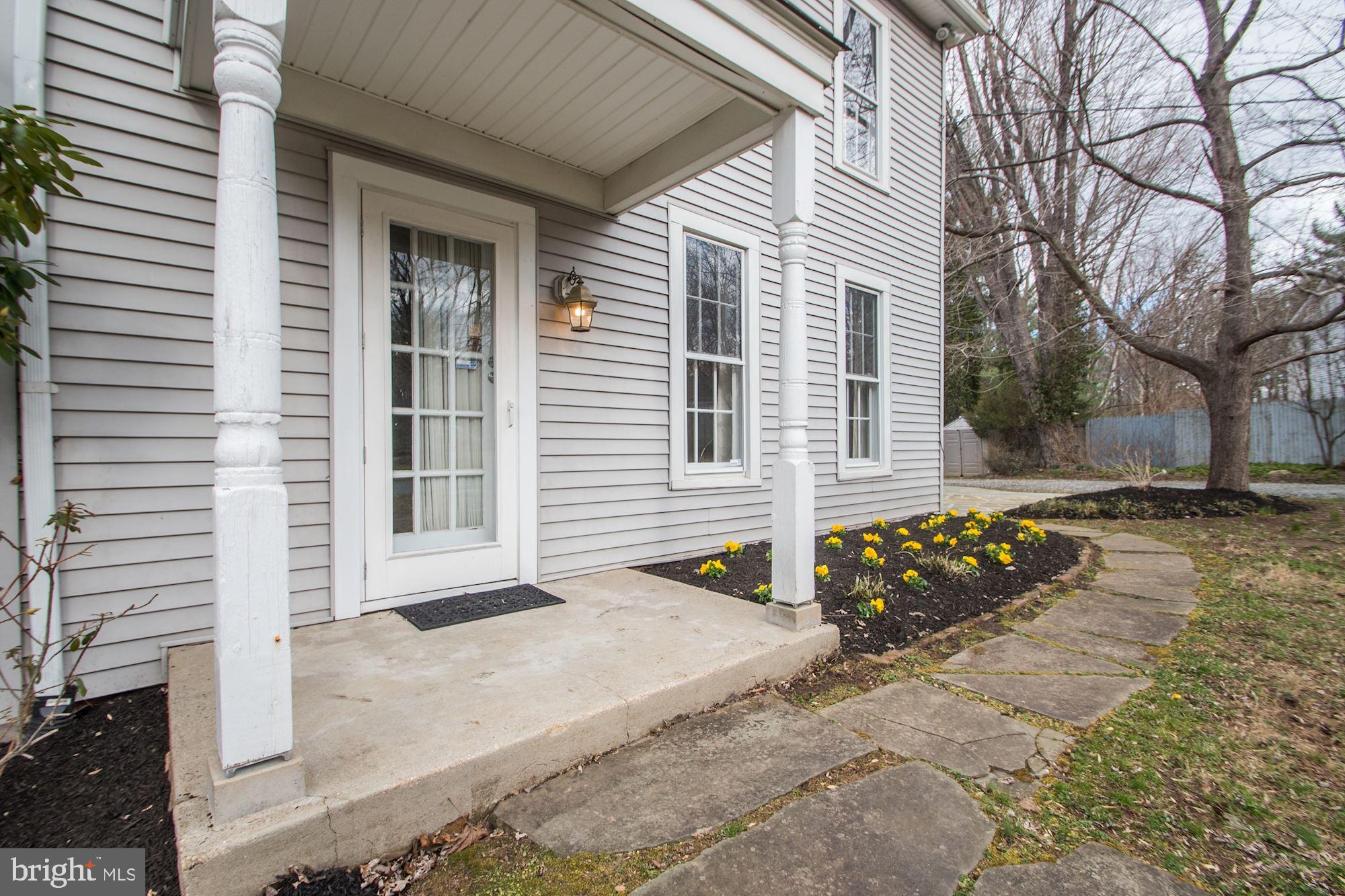 17825 Pond Road Ashton, MD 20861 - Photo 4 of 32 Shed-style portico covers the front porch