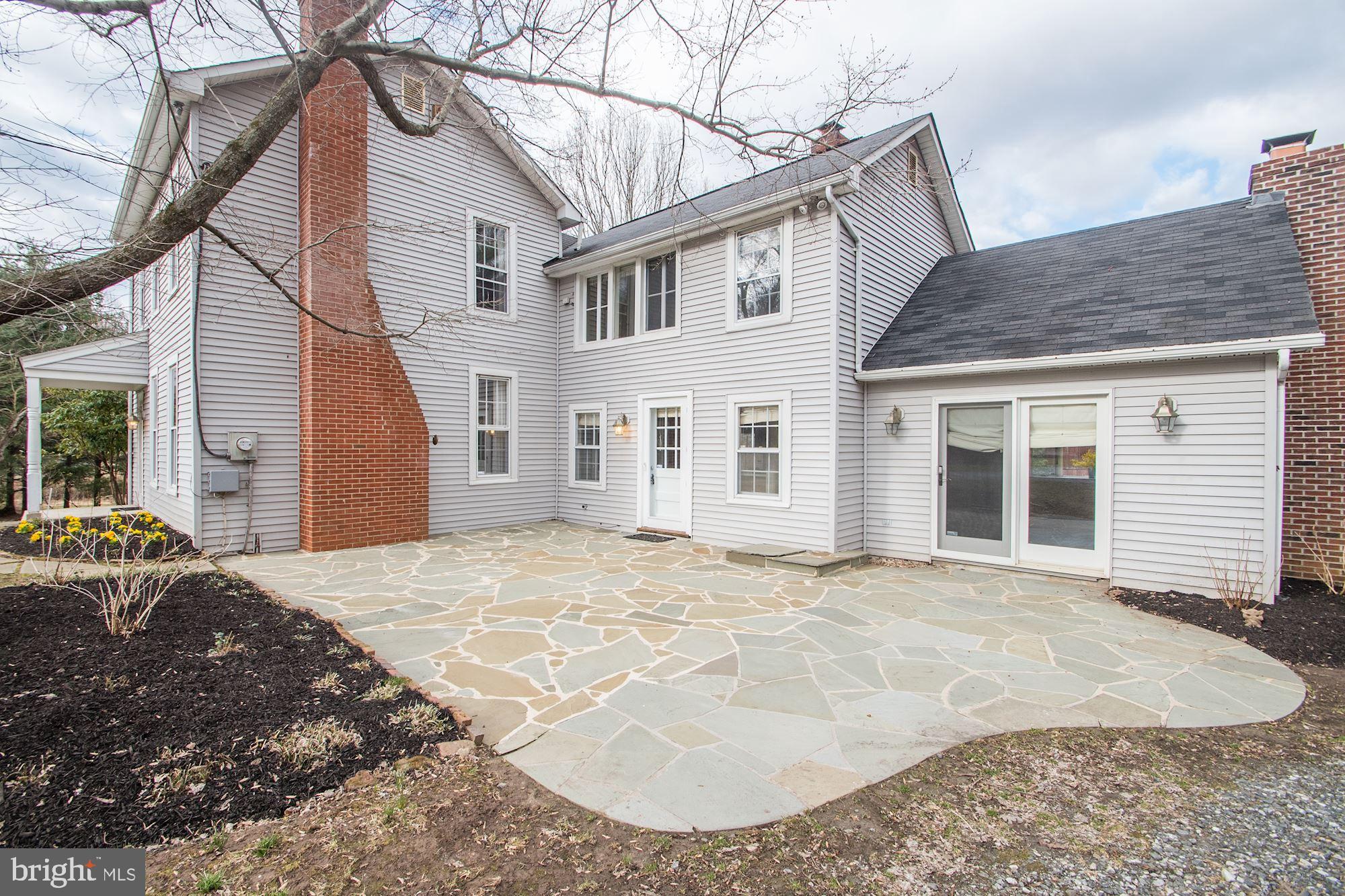 17825 Pond Road Ashton, MD 20861 - Photo 5 of 32 Patio at the front, accessible from the kitchen