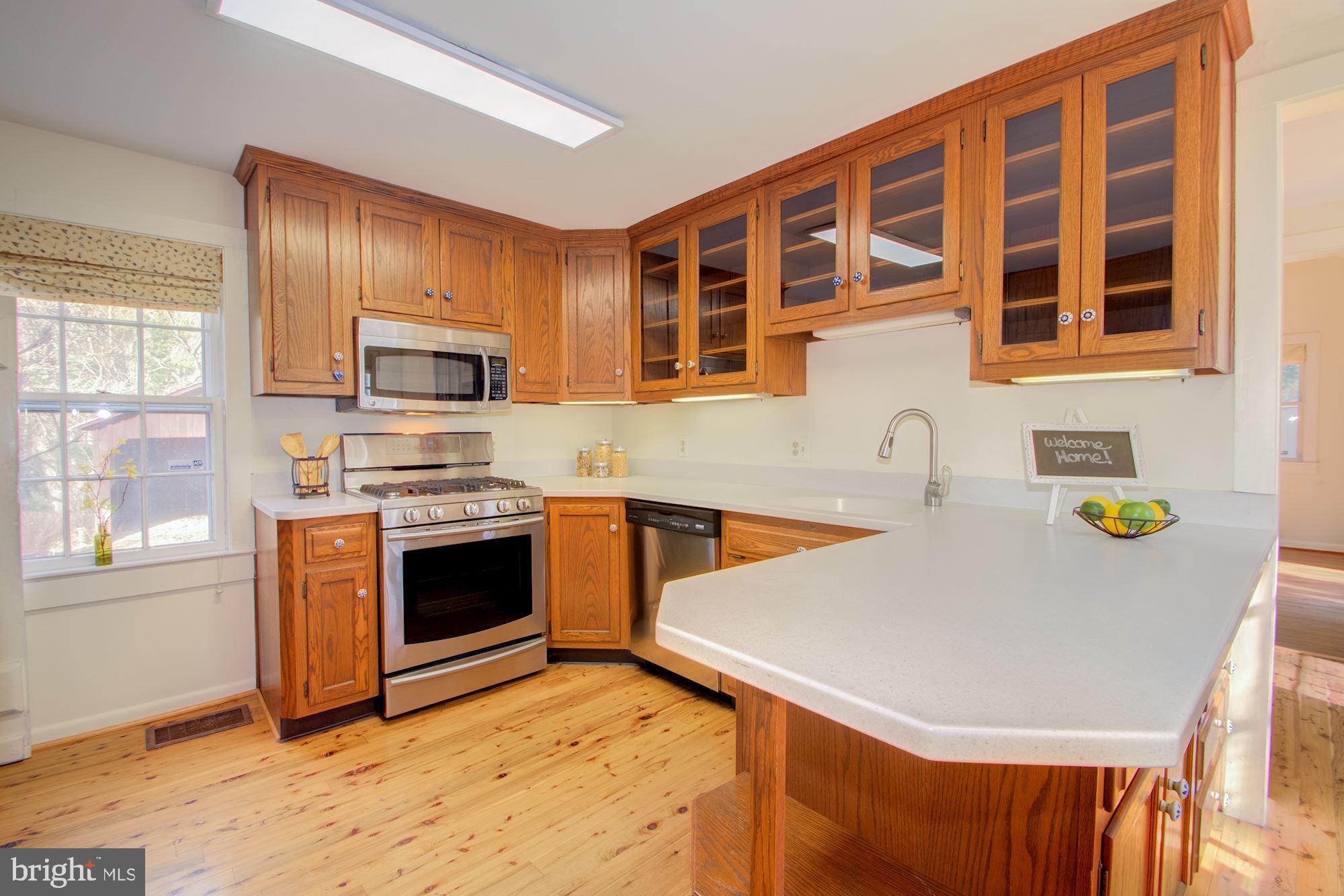 17825 Pond Road Ashton, MD 20861 - Photo 10 of 32 Stainless Steel appliances, glass door cabinets