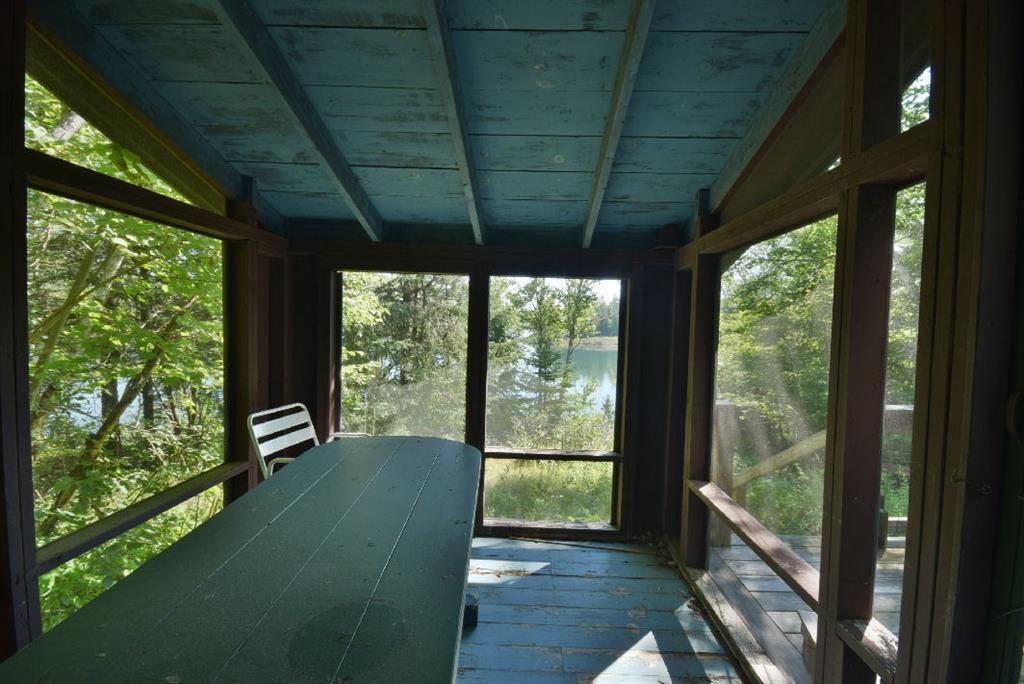 25 Kelly Point Road Lubec, ME 04652 - Photo 10 of 22 Sunshine Annex screened porch