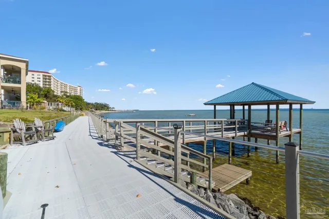 a front view of a building with lake view