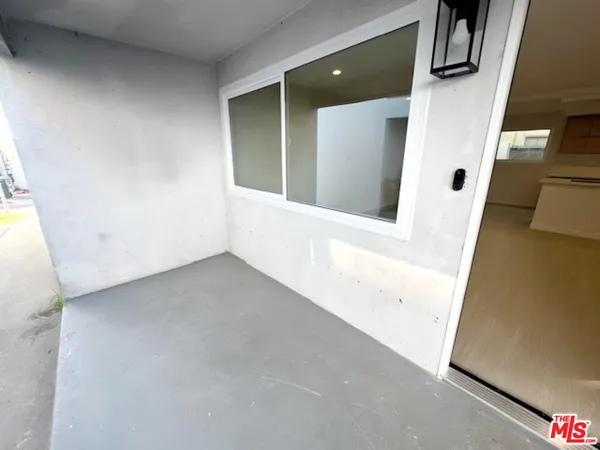 a view of a white door of a house