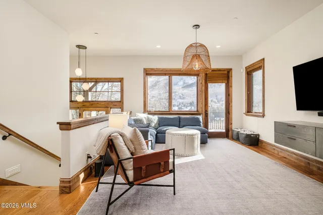 a view of a patio with iron fence