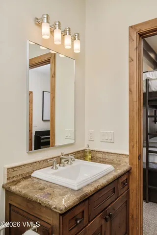 a bedroom with a bed and a walk in closet