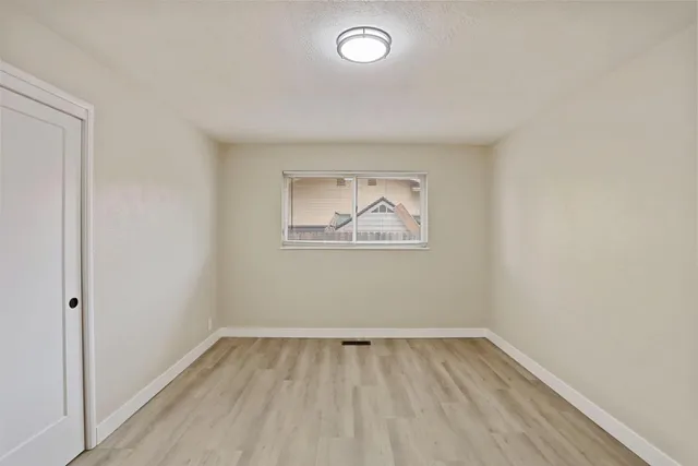 an empty room with a window