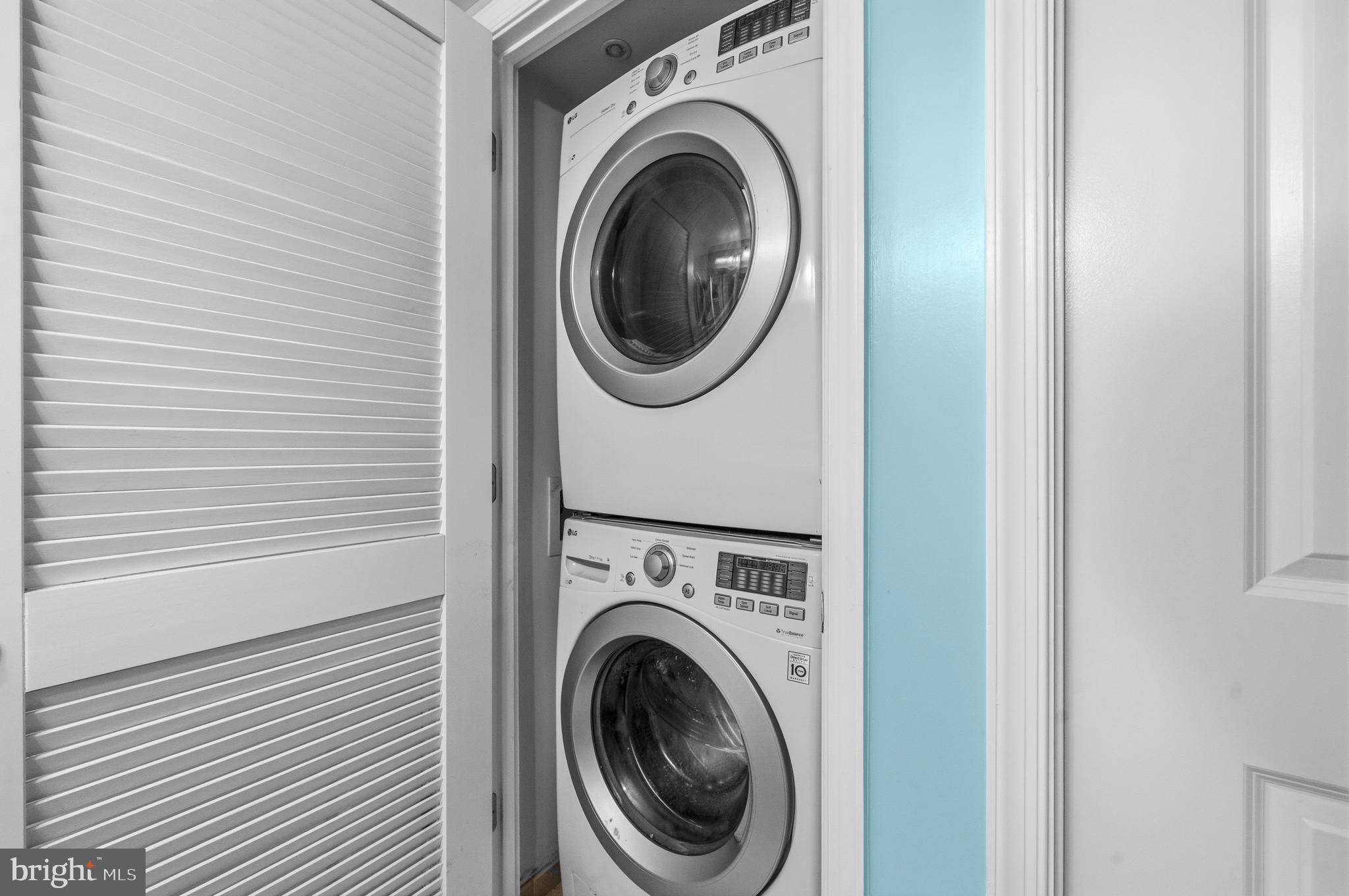 11800 Sunset Hills Road, Unit 726 Reston, VA 20190 - Photo 16 of 36 a view of a hallway with washer and dryer