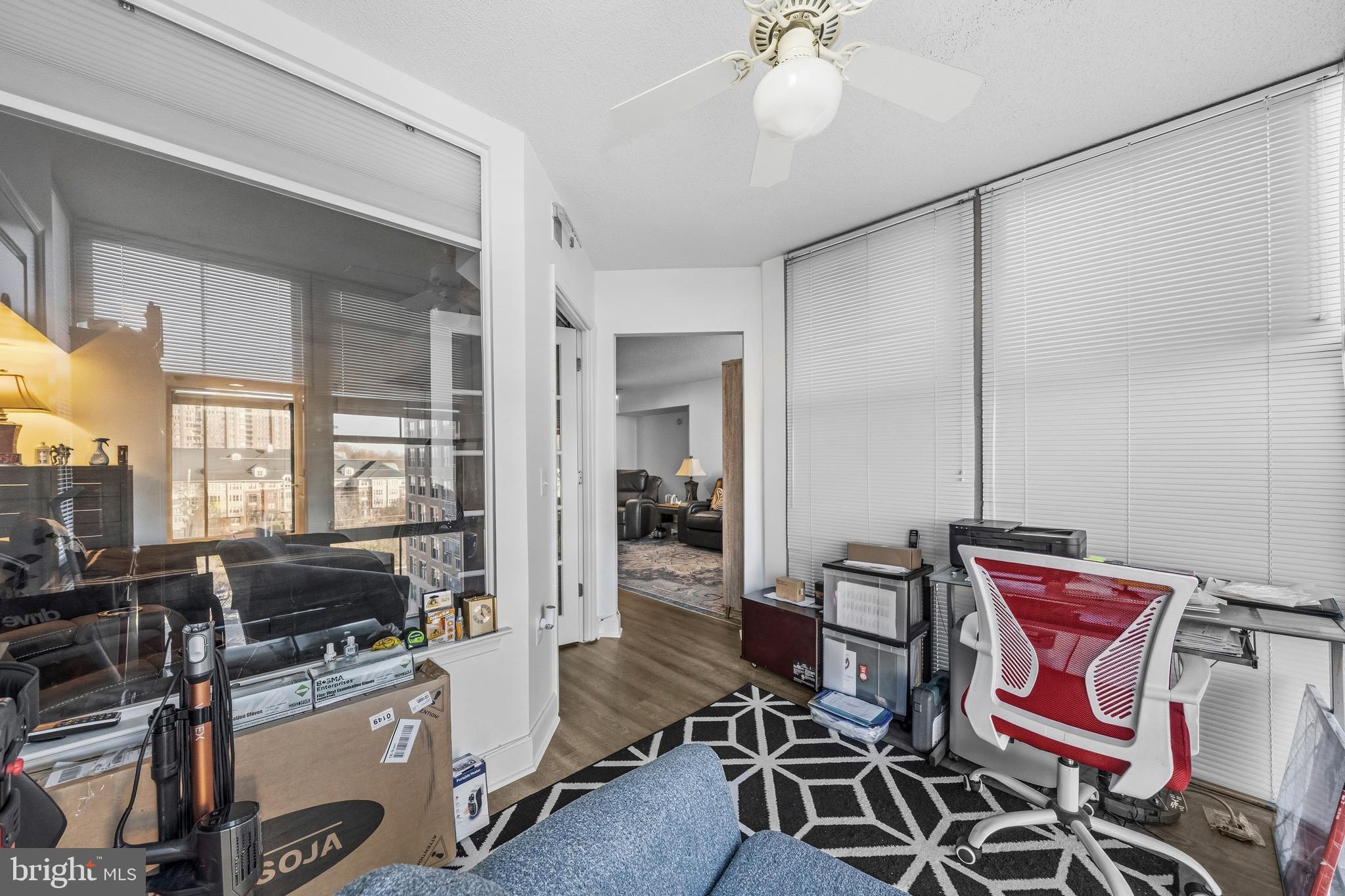 11800 Sunset Hills Road, Unit 726 Reston, VA 20190 - Photo 18 of 36 a view of a dining room with furniture window and outside view
